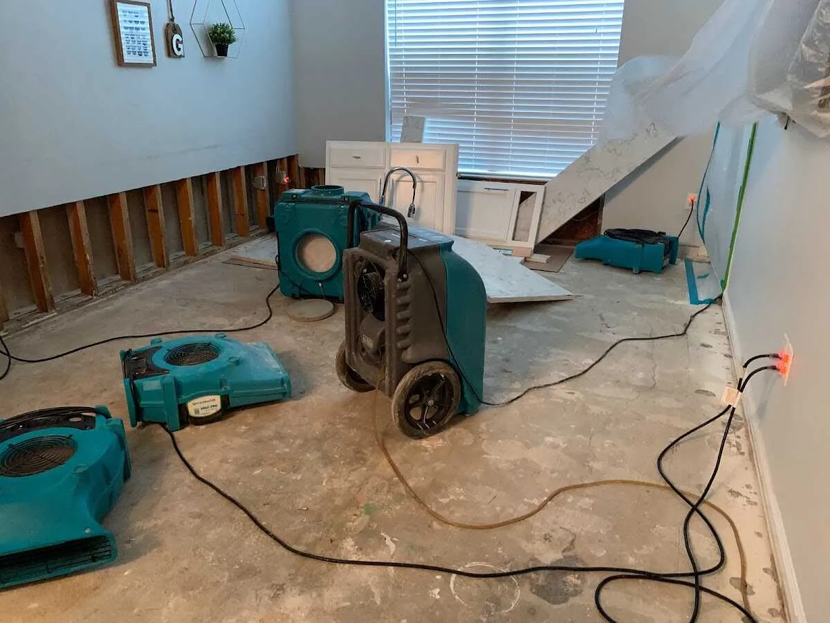 Dehumidifier in flood-cut room for Water Damage Restoration in Murray